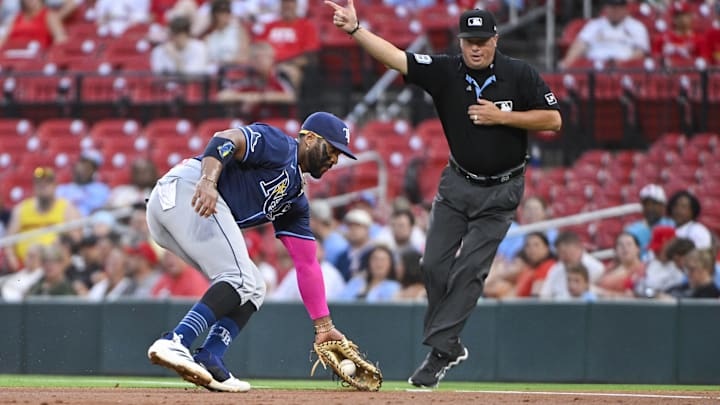 Aug 6, 2024; St. Louis, Missouri, USA; Tampa Bay Rays first baseman Yandy Diaz (2) fields a ground ball against the St. Louis Cardinals during the second inning at Busch Stadium. Mandatory Credit: Jeff Curry-Imagn Images Aug 6, 2024; St. Louis, Missouri, USA; Tampa Bay Rays first baseman Yandy Diaz (2) fields a ground ball against the St. Louis Cardinals during the second inning at Busch Stadium. Mandatory Credit: Jeff Curry-Imagn Images