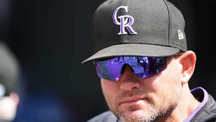 Sep 7, 2025; Denver, Colorado, USA; Colorado Rockies interim manager Warren Schaeffer (34) looks on from the bench before the game against the San Diego Padres at Coors Field Sep 7, 2025; Denver, Colorado, USA; Colorado Rockies interim manager Warren Schaeffer (34) looks on from the bench before the game against the San Diego Padres at Coors Field
