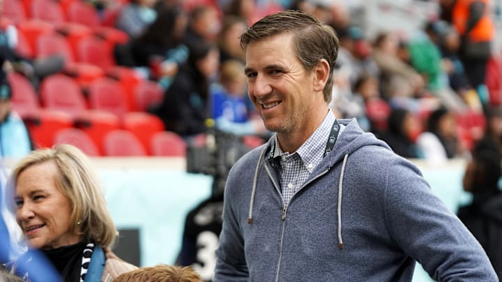 Nov 10, 2024; Harrison, New Jersey, USA; NJ/NY Gotham FC minority owner Eli Manning looks on before a 2024 NWSL Playoffs quarterfinal match against Portland Thorns FC at Red Bull Arena.  