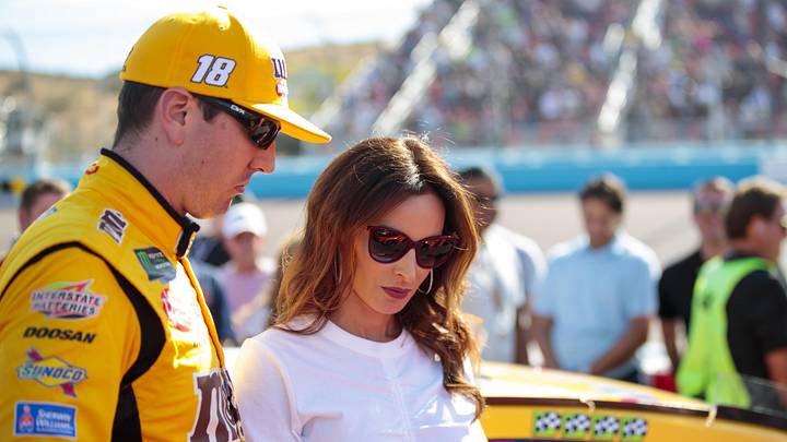 Nov 10, 2019; Avondale, AZ, USA; NASCAR Cup Series driver Kyle Busch (left) and wife Samantha Busch during the Bluegreen Vacations 500 at ISM Raceway. Mandatory Credit: Mark J. Rebilas-Imagn Images Nov 10, 2019; Avondale, AZ, USA; NASCAR Cup Series driver Kyle Busch (left) and wife Samantha Busch during the Bluegreen Vacations 500 at ISM Raceway. Mandatory Credit: Mark J. Rebilas-Imagn Images