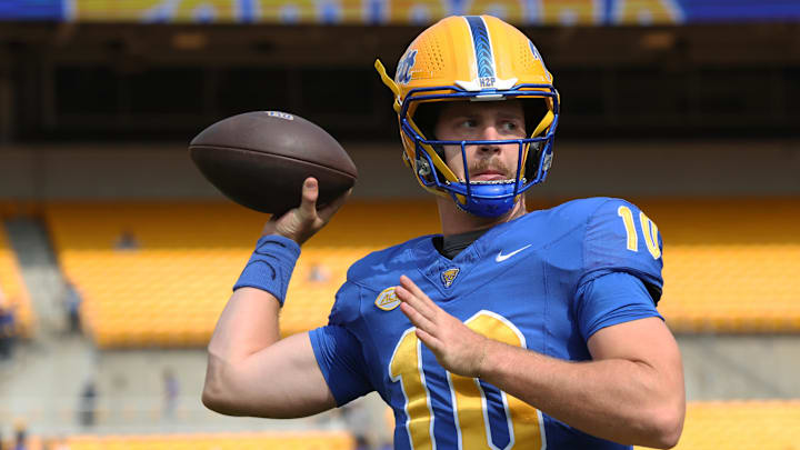 Sep 6, 2025; Pittsburgh, Pennsylvania, USA;  Pittsburgh Panthers quarterback Eli Holstein (10) warms up against the Central Michigan Chippewas at Acrisure Stadium. Mandatory Credit: Charles LeClaire-Imagn Images