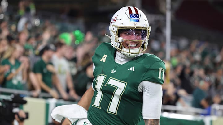 Nov 6, 2025; Tampa, Florida, USA; South Florida Bulls quarterback Byrum Brown (17) celebrates after they scored a touchdown against the UTSA Roadrunners during the second quarter at Raymond James Stadium. Mandatory Credit: Kim Klement Neitzel-Imagn Images