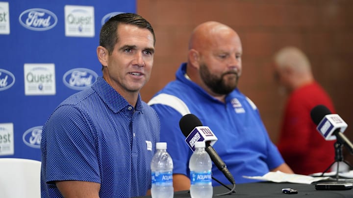 Jul 26, 2023; East Rutherford, NJ, USA; New York Giants general manager Joe Schoen, left, speaks