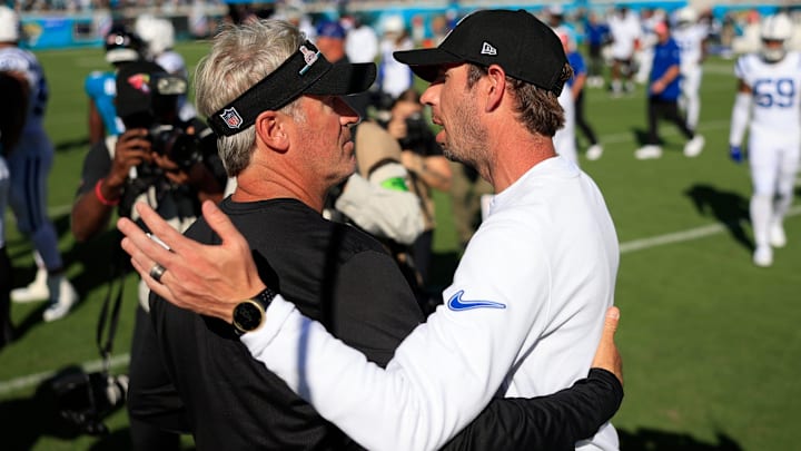 Jacksonville Jaguars head coach Doug Pederson, left, talks with Indianapolis Colts head coach Shane Steichen after the game an NFL football matchup Sunday, Oct. 15, 2023 at EverBank Stadium in Jacksonville, Fla. The Jacksonville Jaguars defeated the Indianapolis Colts 37-20. [Corey Perrine/Florida Times-Union]