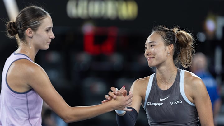 Qinwen shakes hand with Anca Todoni after the women's singles first round match at 2025 Australian Open.