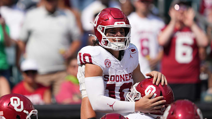 Sep 13, 2025; Philadelphia, Pennsylvania, USA; Oklahoma Sooners quarterback John Mateer (10) celebrates after rushing for a touchdown against the Temple Owls in the second half at Lincoln Financial Field. Mandatory Credit: Kyle Ross-Imagn Images Sep 13, 2025; Philadelphia, Pennsylvania, USA; Oklahoma Sooners quarterback John Mateer (10) celebrates after rushing for a touchdown against the Temple Owls in the second half at Lincoln Financial Field. Mandatory Credit: Kyle Ross-Imagn Images