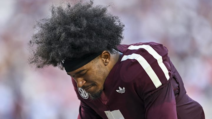 Oct 11, 2025; College Station, Texas, USA; Texas A&M Aggies wide receiver KC Concepcion (7) takes a moment prior to the game against the Florida Gators at Kyle Field. Mandatory Credit: Maria Lysaker-Imagn Images 