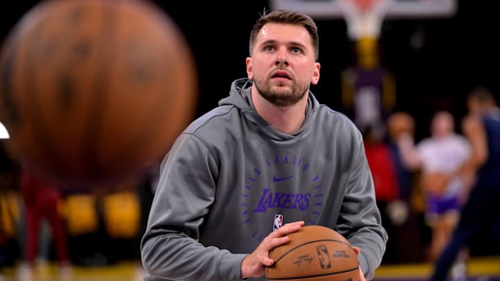 Apr 19, 2025; Los Angeles, California, USA;  Los Angeles Lakers guard Luka Doncic (77) warms up prior to the game against the Minnesota Timberwolves at Crypto.com Arena. Mandatory Credit: Jayne Kamin-Oncea-Imagn Images