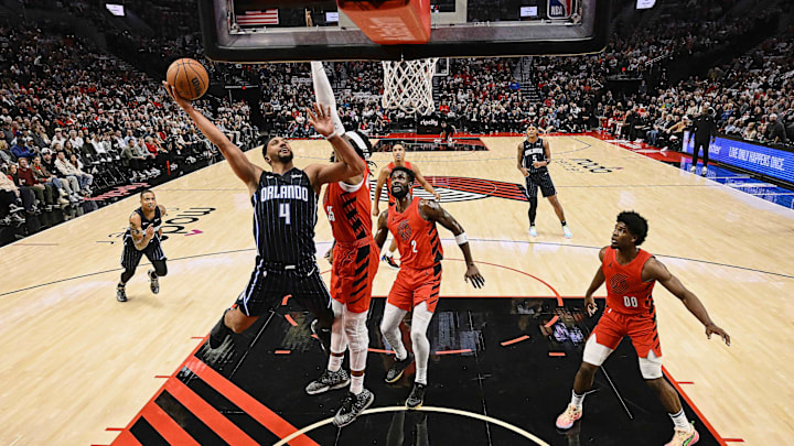 Oct 27, 2023; Portland, Oregon, USA; Orlando Magic guard Jalen Suggs (4) drives to the basket during