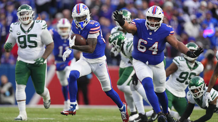 Dec 29, 2024; Orchard Park, New York, USA; Buffalo Bills wide receiver Tyrell Shavers (80) runs with the ball after making a catch and scores a touchdown against the New York Jets during the second half at Highmark Stadium.