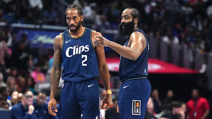 LA Clippers forward Kawhi Leonard (2) and guard James Harden (1) talk during their game against the New Orleans Pelicans in the second half at Crypto.com Arena. Mandatory Credit: Kirby Lee-Imagn Images