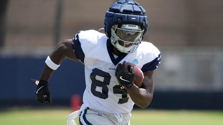 Dallas Cowboys wide receiver Kelvin Harmon carries the ball at training camp at the River Ridge Fields in Oxnard, California. Dallas Cowboys wide receiver Kelvin Harmon carries the ball at training camp at the River Ridge Fields in Oxnard, California.