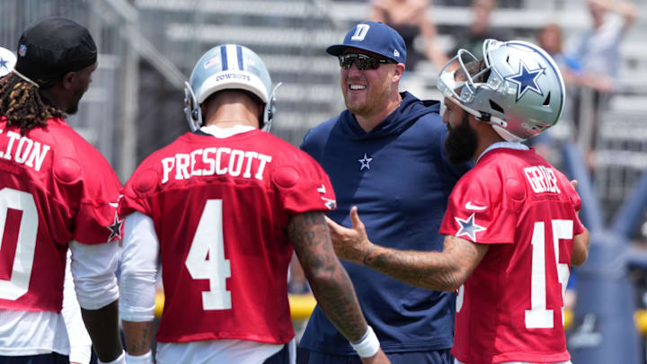 Dallas Cowboys quarterbacks coach Steve Shimko talks with Joe Milton III, Dak Prescott, and Will Grier during training camp Dallas Cowboys quarterbacks coach Steve Shimko talks with Joe Milton III, Dak Prescott, and Will Grier during training camp