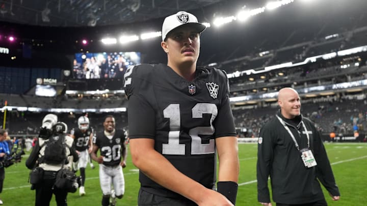 Dec 22, 2024; Paradise, Nevada, USA; Las Vegas Raiders quarterback Aidan O'Connell (12) leaves the field after the game against the Jacksonville Jaguars at Allegiant Stadium. Mandatory Credit: Kirby Lee-Imagn Images