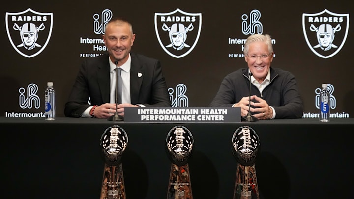 Jan 27, 2025; Las Vegas, NV, USA; Las Vegas Raiders general manager John Spytek (left) and coach Pete Carroll at press conference at Intermountain Health Performance Center. Mandatory Credit: Kirby Lee-Imagn Images