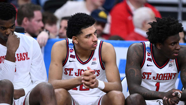 Mar 22, 2025; Providence, RI, USA; St. John's basketball guard RJ Luis Jr. (12), guard Kadary Richmond (1) and teammates on the bench during the second half of a second round men’s NCAA Tournament game against the Arkansas Razorbacks at Amica Mutual Pavilion.