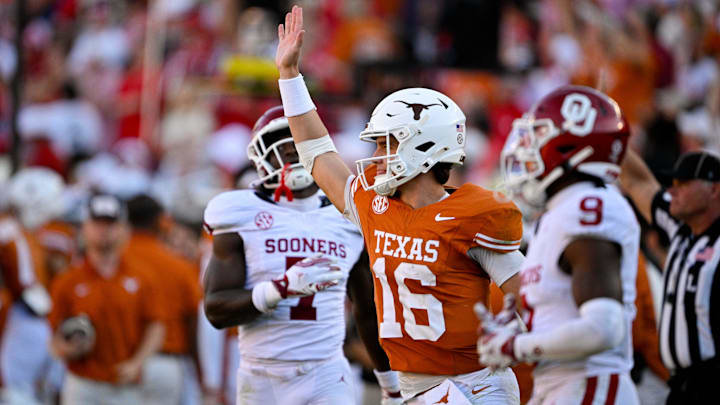 Texas Longhorns quarterback Arch Manning waves to the Oklahoma Sooners 