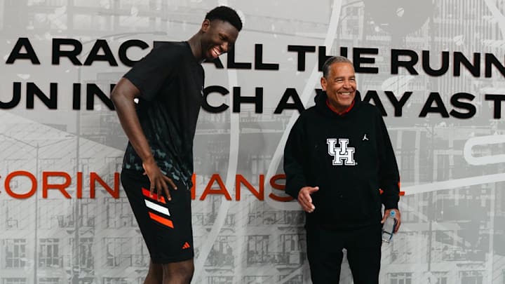 Arafan Diane meets with Houston coach Kelvin Sampson. Arafan Diane meets with Houston coach Kelvin Sampson.