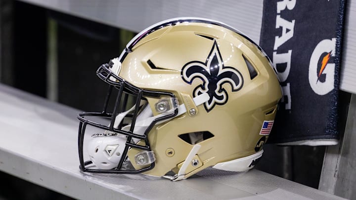 Nov 5, 2023; New Orleans, Louisiana, USA;  Detailed view of the New Orleans Saints helmet on the team bench against the Chicago Bears during the first half at the Caesars Superdome. Mandatory Credit: Stephen Lew-Imagn Images