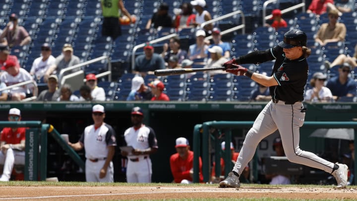 Jun 20, 2024; Washington, District of Columbia, USA; Arizona Diamondbacks outfielder Jake McCarthy (31) singles against the Washington Nationals during the second inning at Nationals Park. Mandatory Credit: Geoff Burke-USA TODAY Sports Jun 20, 2024; Washington, District of Columbia, USA; Arizona Diamondbacks outfielder Jake McCarthy (31) singles against the Washington Nationals during the second inning at Nationals Park. Mandatory Credit: Geoff Burke-USA TODAY Sports