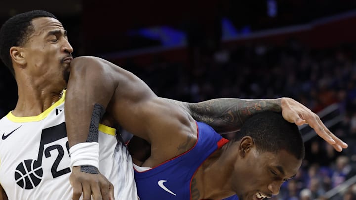 Dec 19, 2024; Detroit, Michigan, USA;  Detroit Pistons center Jalen Duren (0) is fouled by Utah Jazz forward John Collins (20) in the first half at Little Caesars Arena. Mandatory Credit: Rick Osentoski-Imagn Images