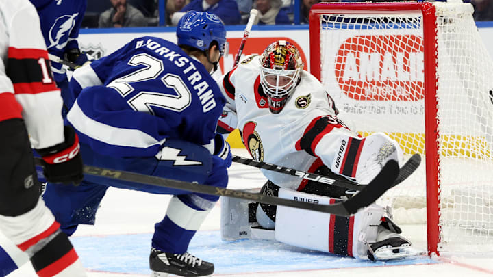 Oct 9, 2025; Tampa, Florida, USA; Tampa Bay Lightning right wing Oliver Bjorkstrand (22) scores a goal on Ottawa Senators goaltender Linus Ullmark (35) during the first period at Benchmark International Arena. Mandatory Credit: Kim Klement Neitzel-Imagn Images