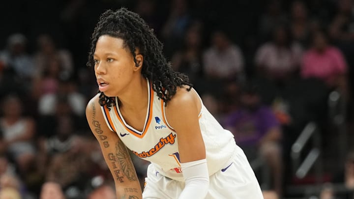 Aug 5, 2023; Phoenix, Arizona, USA; Phoenix Mercury guard Sug Sutton (1) dribbles against the Seattle Storm during the first half at Footprint Center. Mandatory Credit: Joe Camporeale-Imagn Images