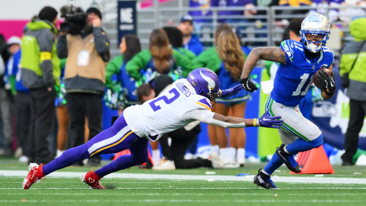 Nov 30, 2025; Seattle, Washington, USA; Seattle Seahawks wide receiver Jaxon Smith-Njigba (11) runs the ball after a catch during the second half against the Minnesota Vikings at Lumen Field. Mandatory Credit: Steven Bisig-Imagn Images