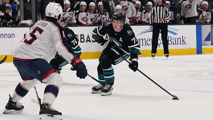 Jan 6, 2026; San Jose, California, USA; San Jose Sharks center Macklin Celebrini (71) looks to get a shot off in front of Columbus Blue Jackets defenseman Dante Fabbro (15) as San Jose Sharks left wing William Eklund (72) trails the play in the second period at SAP Center at San Jose. Mandatory Credit: David Gonzales-Imagn Images Jan 6, 2026; San Jose, California, USA; San Jose Sharks center Macklin Celebrini (71) looks to get a shot off in front of Columbus Blue Jackets defenseman Dante Fabbro (15) as San Jose Sharks left wing William Eklund (72) trails the play in the second period at SAP Center at San Jose. Mandatory Credit: David Gonzales-Imagn Images