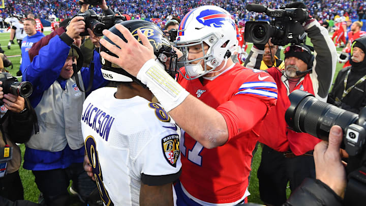 Baltimore Ravens quarterback Lamar Jackson (8) greets Buffalo Bills quarterback Josh Allen (17)