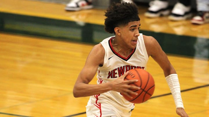 Newport sophomore Taylen Kinney races to the basket during the Ohio Valley Hoops Classic Dec. 1, 2023 at Mason's high school gymnasium. Newport beat two-time defending OHSAA Division IV state champion Richmond Heights 74-69, snapping the Spartans' 49-game win streak. Newport sophomore Taylen Kinney races to the basket during the Ohio Valley Hoops Classic Dec. 1, 2023 at Mason's high school gymnasium. Newport beat two-time defending OHSAA Division IV state champion Richmond Heights 74-69, snapping the Spartans' 49-game win streak.
