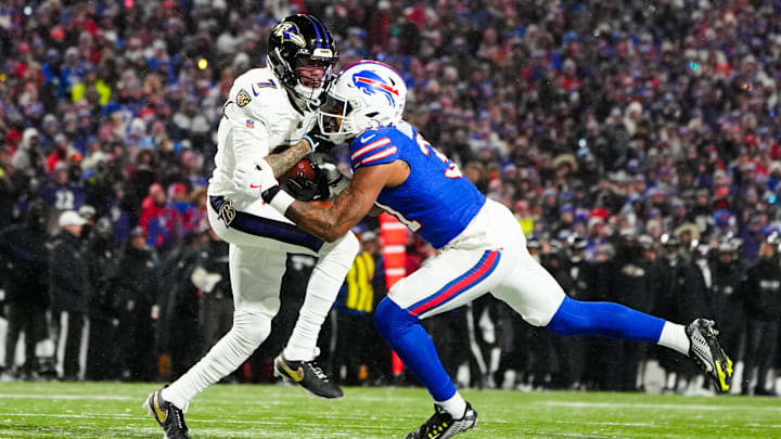 Jan 19, 2025; Orchard Park, New York, USA; Baltimore Ravens wide receiver Rashod Bateman (7) makes a catch against Buffalo Bills cornerback Rasul Douglas (31) during the second quarter in a 2025 AFC divisional round game at Highmark Stadium.