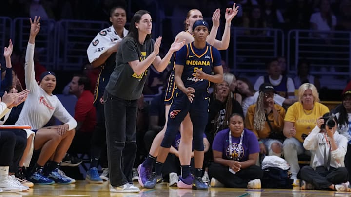 Aug 5, 2025; Los Angeles, California, USA; Indiana Fever guard Caitlin Clark (22) reacts from the bench in the second half against the LA Sparks at Crypto.com Arena. Mandatory Credit: Kirby Lee-Imagn Images
