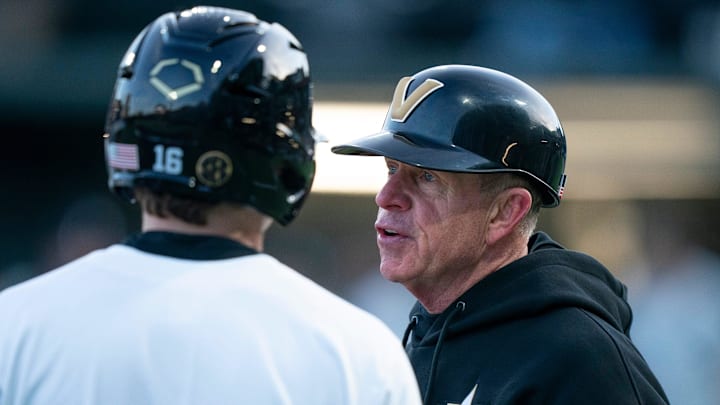 Vanderbilt Commodores catcher Mac Rose (16) talks with Head Coach Tim Corbin during their game against the Air Force Falcons at Hawkins Field in Nashville, Tenn., Monday, Feb. 17, 2025. The Commodores beat the Falcons 3-1.