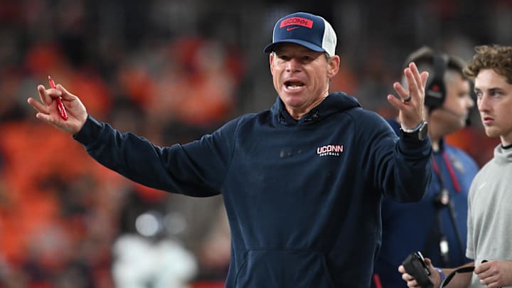 Nov 23, 2024; Syracuse, New York, USA; Connecticut Huskies head coach Jim Mora reacts to a call in the third quarter game against the Syracuse Orange at the JMA Wireless Dome. Mandatory Credit: Mark Konezny-Imagn Images
