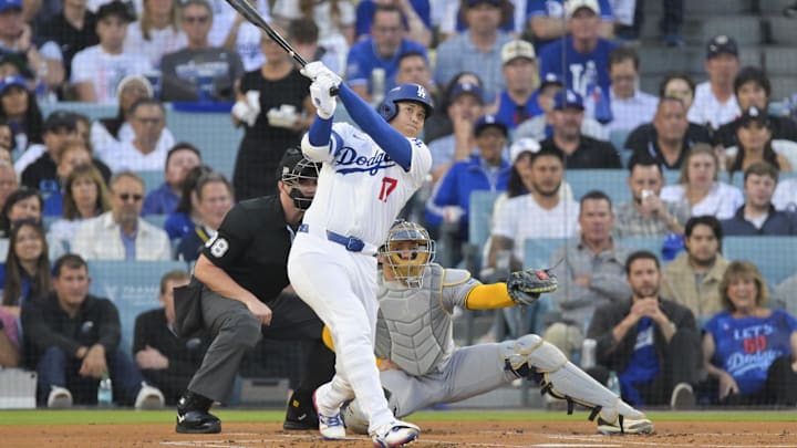 Los Angeles Dodgers two-way player Shohei Ohtani (17) hits a home run against the Milwaukee Brewers during the first inning of game four of the NLCS round for the 2025 MLB playoffs at Dodger Stadium on Oct. 17.