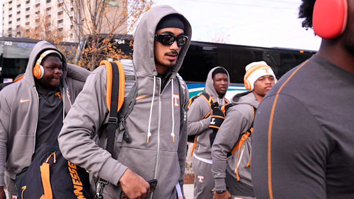 Nov 30, 2024; Nashville, Tennessee, USA; Tennessee Volunteers quarterback Nico Iamaleava (8) walks into stadium just prior to the start of the game against the Tennessee Volunteers at FirstBank Stadium. Mandatory Credit: Steve Roberts-Imagn Images Nov 30, 2024; Nashville, Tennessee, USA; Tennessee Volunteers quarterback Nico Iamaleava (8) walks into stadium just prior to the start of the game against the Tennessee Volunteers at FirstBank Stadium. Mandatory Credit: Steve Roberts-Imagn Images