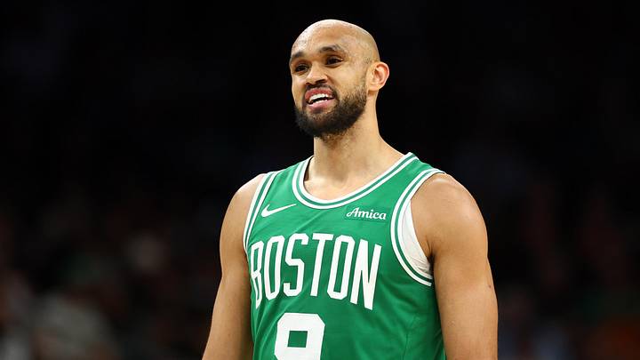 Feb 24, 2026; Phoenix, Arizona, USA; Boston Celtics guard Derrick White (9) against the Phoenix Suns at Mortgage Matchup Center. Mandatory Credit: Mark J. Rebilas-Imagn Images
