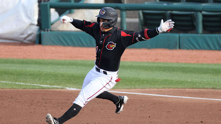 Rochester's Franklin Barreto puts on the brakes after rounding first base.