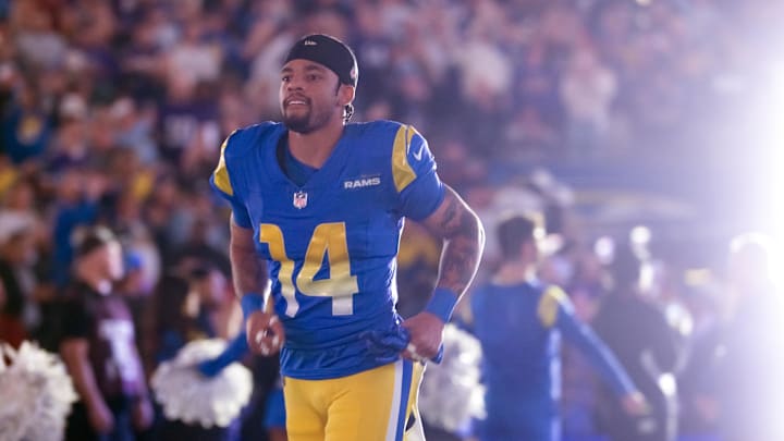 Jan 13, 2025; Glendale, AZ, USA; Los Angeles Rams cornerback Cobie Durant (14) against the Minnesota Vikings during an NFC wild card game at State Farm Stadium. Mandatory Credit: Mark J. Rebilas-Imagn Images