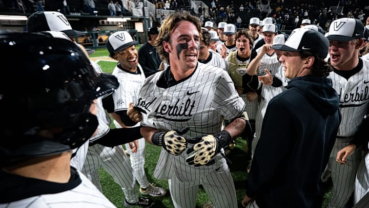 Vanderbilt third baseman Brodie Johnston (9) celebrates his walk-off grand slam against Xavier during the seventh inning at Hawkins Field in Nashville, Tenn., Friday, March 7, 2025. Vanderbilt won 15-3.