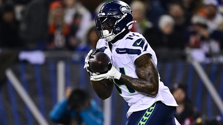 Dec 26, 2024; Chicago, Illinois, USA; Seattle Seahawks wide receiver DK Metcalf (14) makes a catch against the Chicago Bears during the first quarter at Soldier Field. Mandatory Credit: Daniel Bartel-Imagn Images