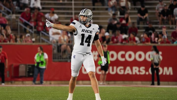 Sep 14, 2024; Houston, Texas, USA; Rice Owls tight end Boden Groen (14) checks with the sideline in the second quarter at TDECU Stadium. Mandatory Credit: Sean Thomas-Imagn Images