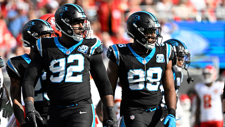 Carolina Panthers DE Jonathan Harris and LB D.J. Wonnum on the field in the first quarter at Bank of America Stadium.