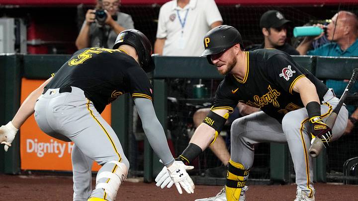 May 7, 2026; Phoenix, Arizona, USA; Pittsburgh Pirates second baseman Brandon Lowe (5) celebrates with right fielder Ryan O'Hearn (29) after hitting a solo home run against the Arizona Diamondbacks in the first inning at Chase Field. Mandatory Credit: Rick Scuteri-Imagn Images