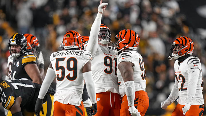 Jan 4, 2025; Pittsburgh, Pennsylvania, USA; Cincinnati Bengals defensive end Trey Hendrickson (91) celebrates after sacking Pittsburgh Steelers quarterback Russell Wilson (not pictured) in the first quarter at Acrisure Stadium. Mandatory Credit: Sam Greene/USA TODAY Network via Imagn Images