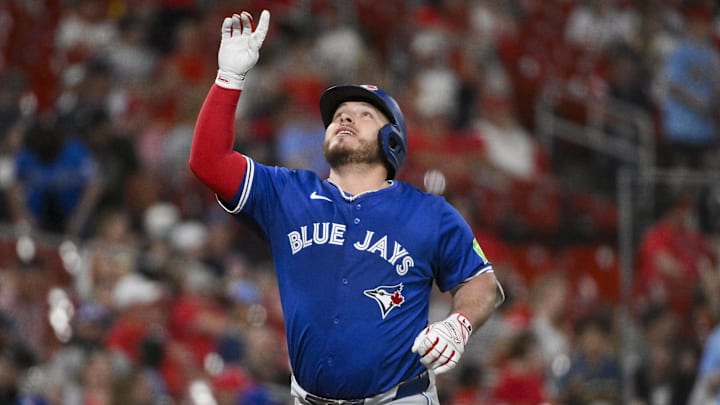 Jun 9, 2025; St. Louis, Missouri, USA;  Toronto Blue Jays catcher Alejandro Kirk (30) reacts after hitting a solo home run against the St. Louis Cardinals during the eighth inning at Busch Stadium. 