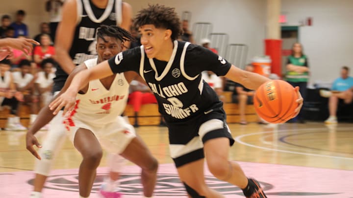 Taylen Kinney (0) dribbles by a defender during an AAU basketball game July 4, 2023, at the Nike EYBL Peach Jam in North Augusta, S.C. A Newport native, Kinney is a Class of 2026 recruit and holds a scholarship offer to play at Louisville.