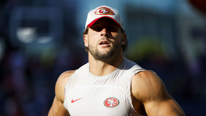 Oct 10, 2024; Seattle, Washington, USA; San Francisco 49ers defensive end Nick Bosa (97) returns to the locker room following early pregame warmups against the Seattle Seahawks at Lumen Field. Mandatory Credit: Joe Nicholson-Imagn Images