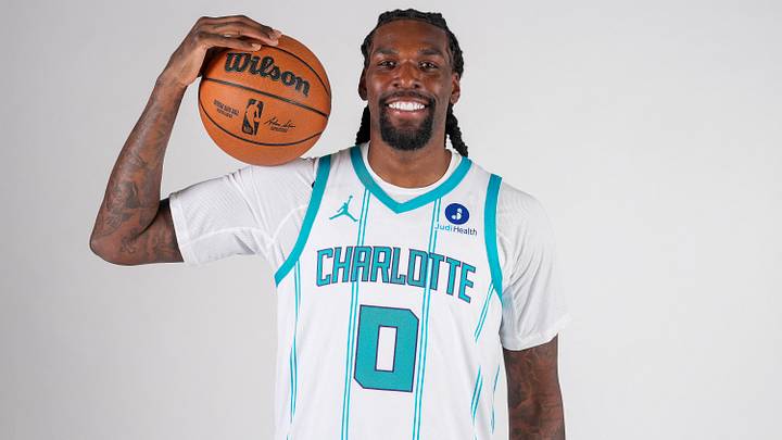 Sep 28, 2026; Charlotte, NC, USA;  Charlotte Hornets player Naz Reid (0) poses for photos during media day at the Spectrum Center.  Mandatory Credit: Jim Dedmon-Imagn Images